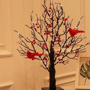 Red and Black Holiday Decor Tree with Ornaments and Minimalist Design
